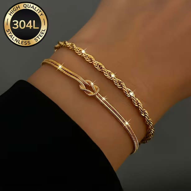 Tresse Dorée Duo Bracelet Set – 18K gold rope and knot bracelets worn on wrist, grey background