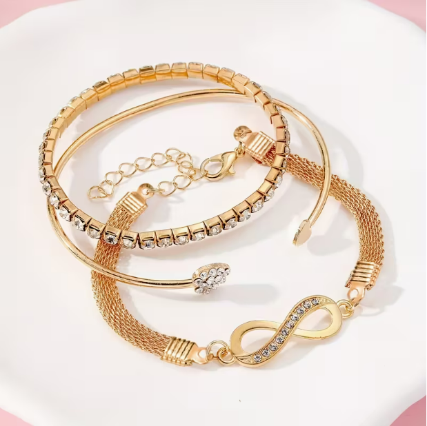 Lumière Trio Bracelet Set flat lay on white surface