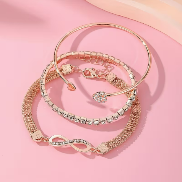 Lumière Trio Bracelet Set worn on wrist - white background