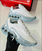 Nike Air Max Dn White Blue – pair held in hand showing side profile