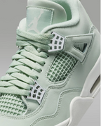 Air Jordan 4 Retro Abundance Seafoam – close-up of lace locks and quarter panel detail