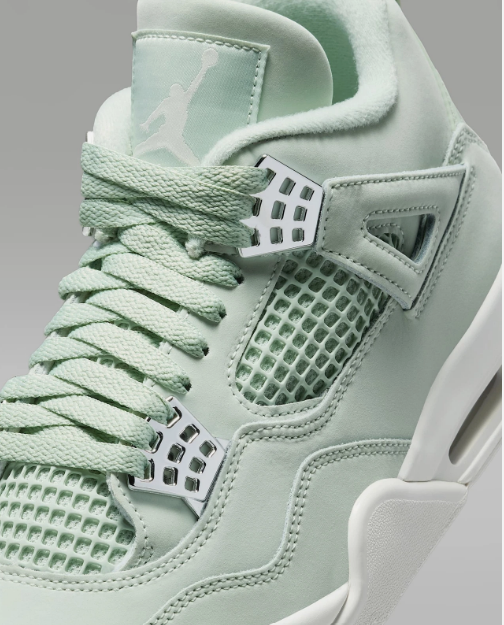 Air Jordan 4 Retro Abundance Seafoam – close-up of lace locks and quarter panel detail