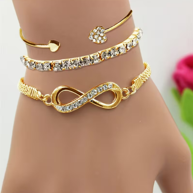 Lumière Trio Bracelet Set worn on wrist - dark background